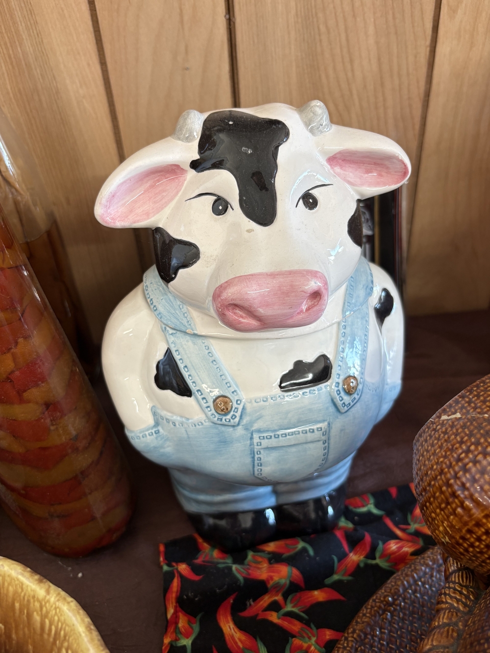 Ceramic Farm Cow Figurine in White, Black & Pink with Blue Overalls